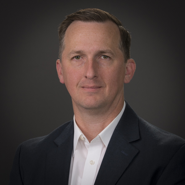 Beyond the Hardware: Why AI Data Centers Need a Liquid-Cooling Strategy carn, chuck smile 6 8 2022 7 low res